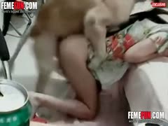 A housewife and her amateur dog were in the kitchen, attempting to engage in xxx sex.